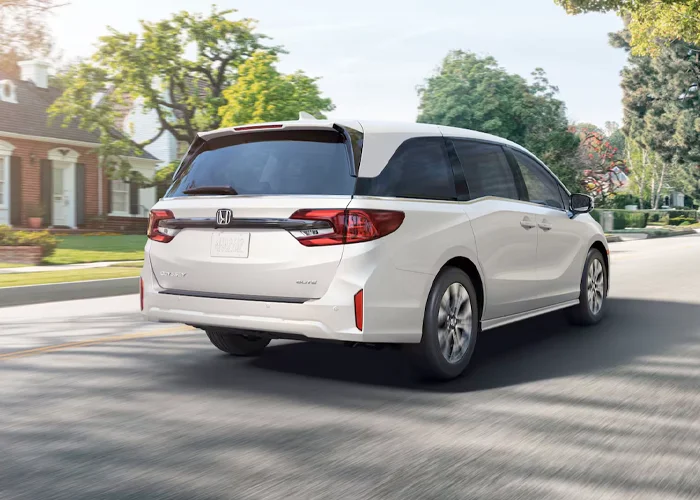Honda Civic driving down a road from above