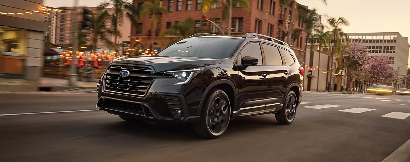 Flexible Subaru Financing and Leasing Subaru Ascent Driving Down City Road