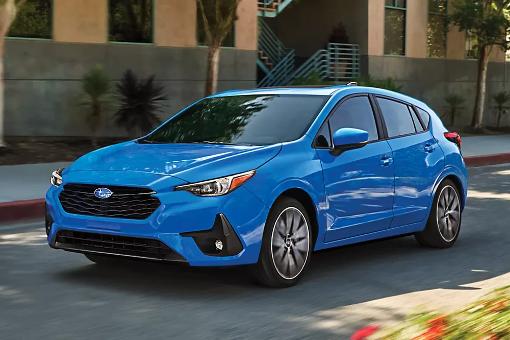 Pre-Owned Subarus Subaru Impreza Driving down Road