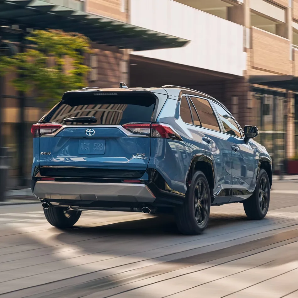 Toyota RAV4 Driving Down Road