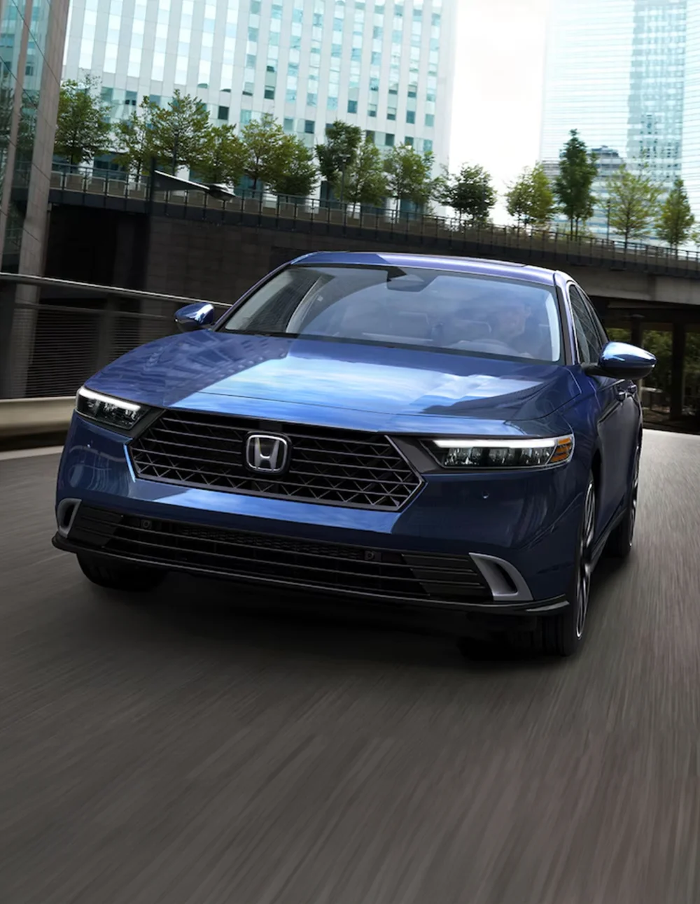 Honda Accord Driving down city road