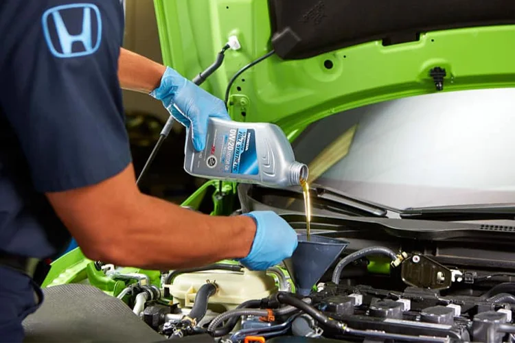 Honda Tech changing oil