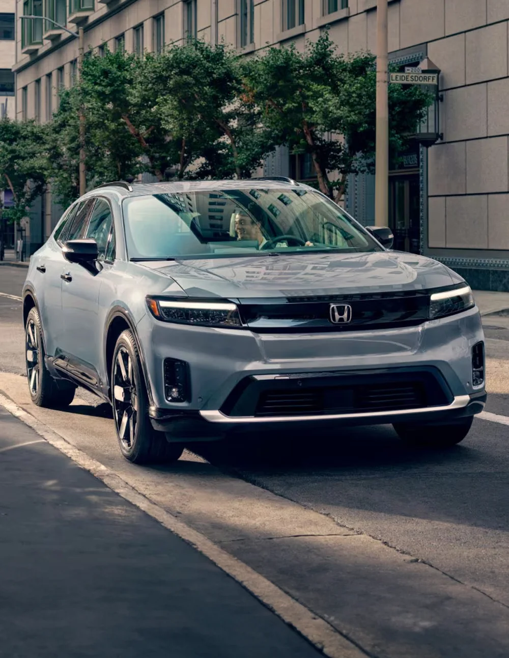Honda Prologue parked on road side