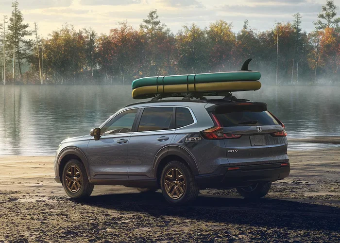 Honda CR-V parked by a lake