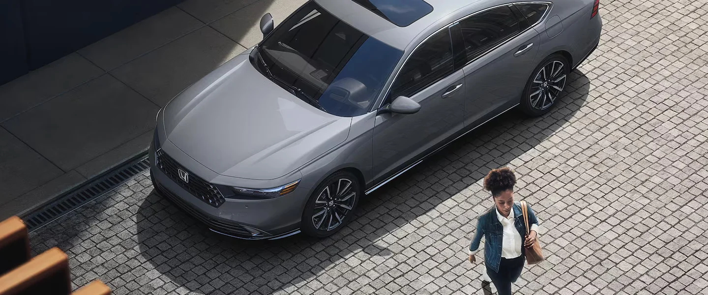 Honda Prologue parked on road side