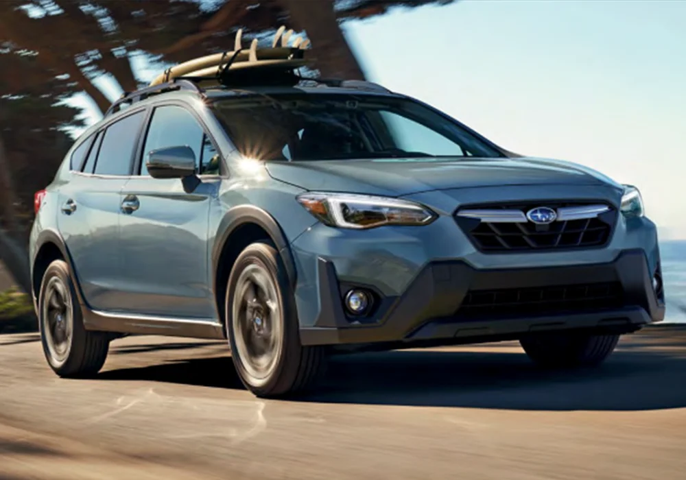 Subaru Crosstrek driving down the street